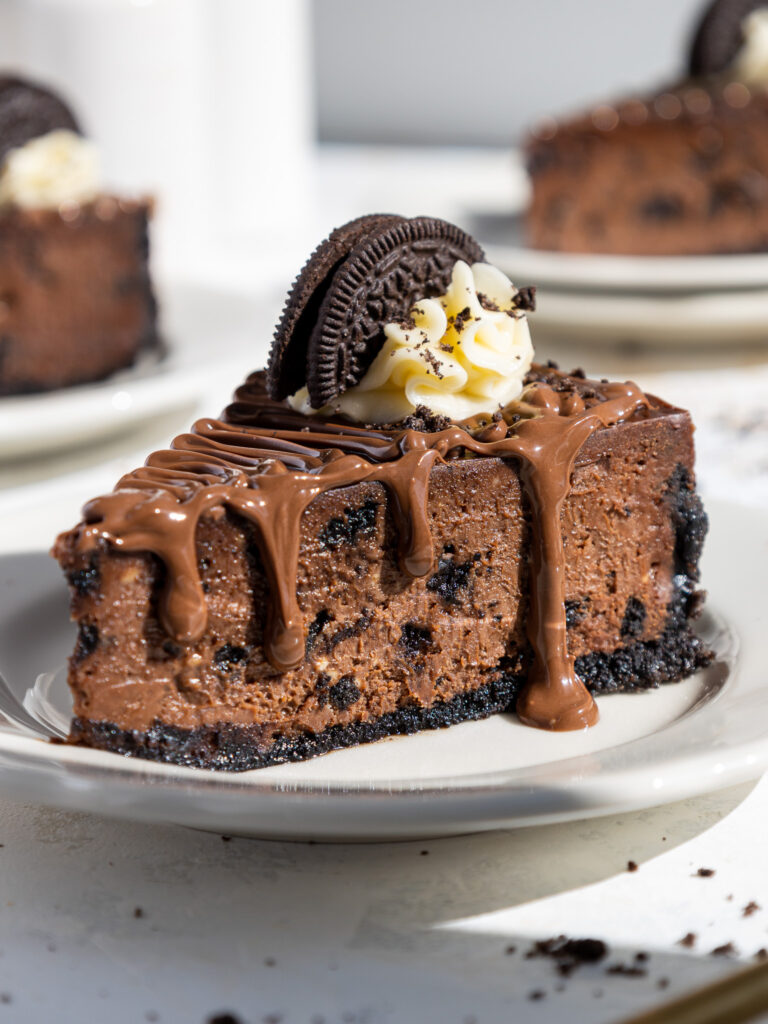 image of a slice of nutella oreo cheesecake on a plate