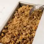 image of cinnamon streusel on top of a loaf of banana bread