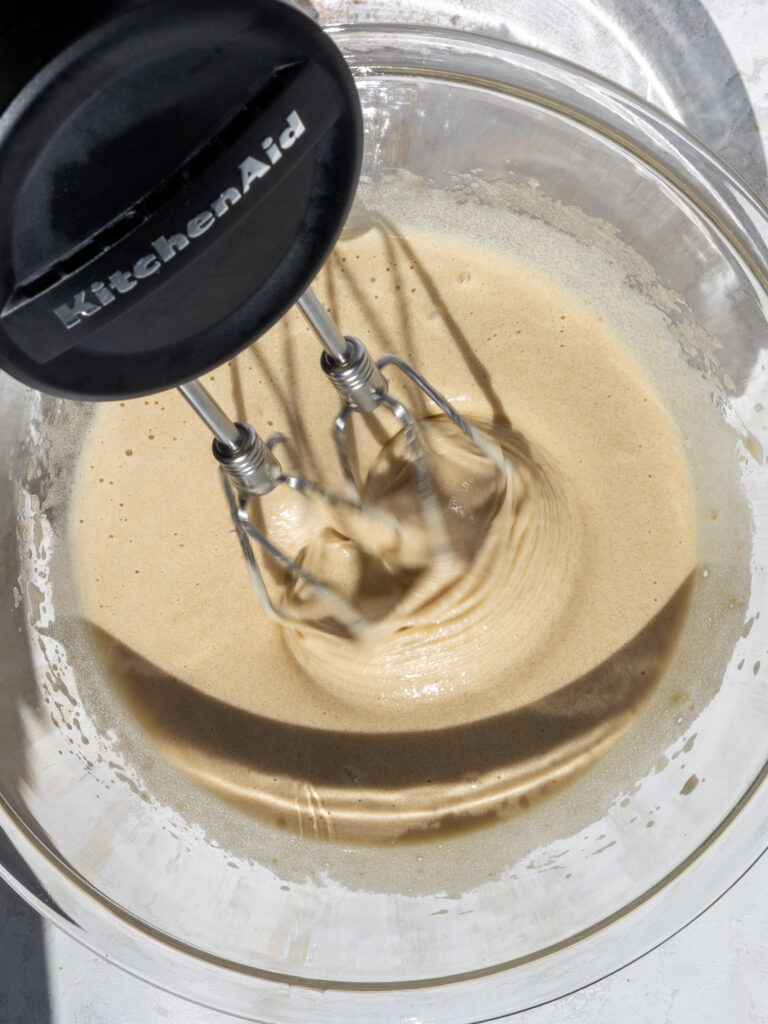 image of eggs and sugar being whipped together to make brownies