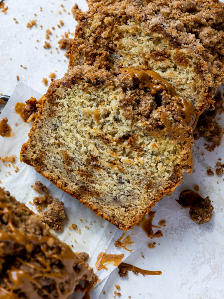 image of a loaf of biscoff banana bread that's been cut into slices