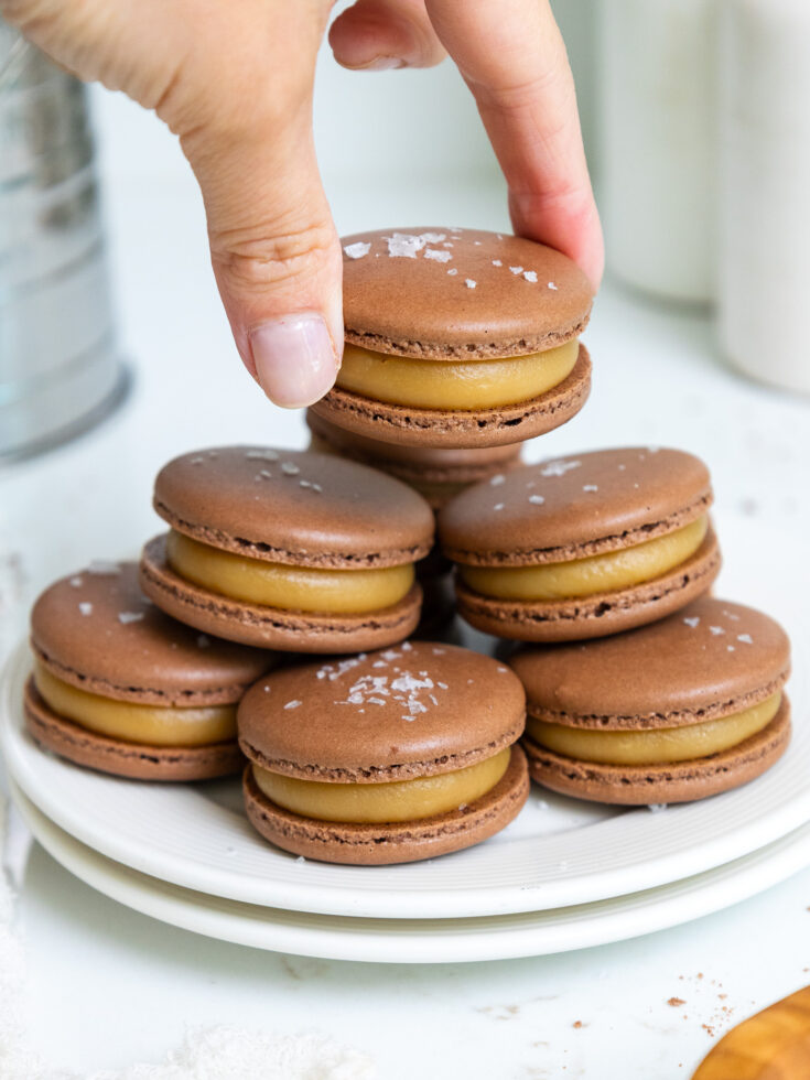 image of caramel macarons being stacked