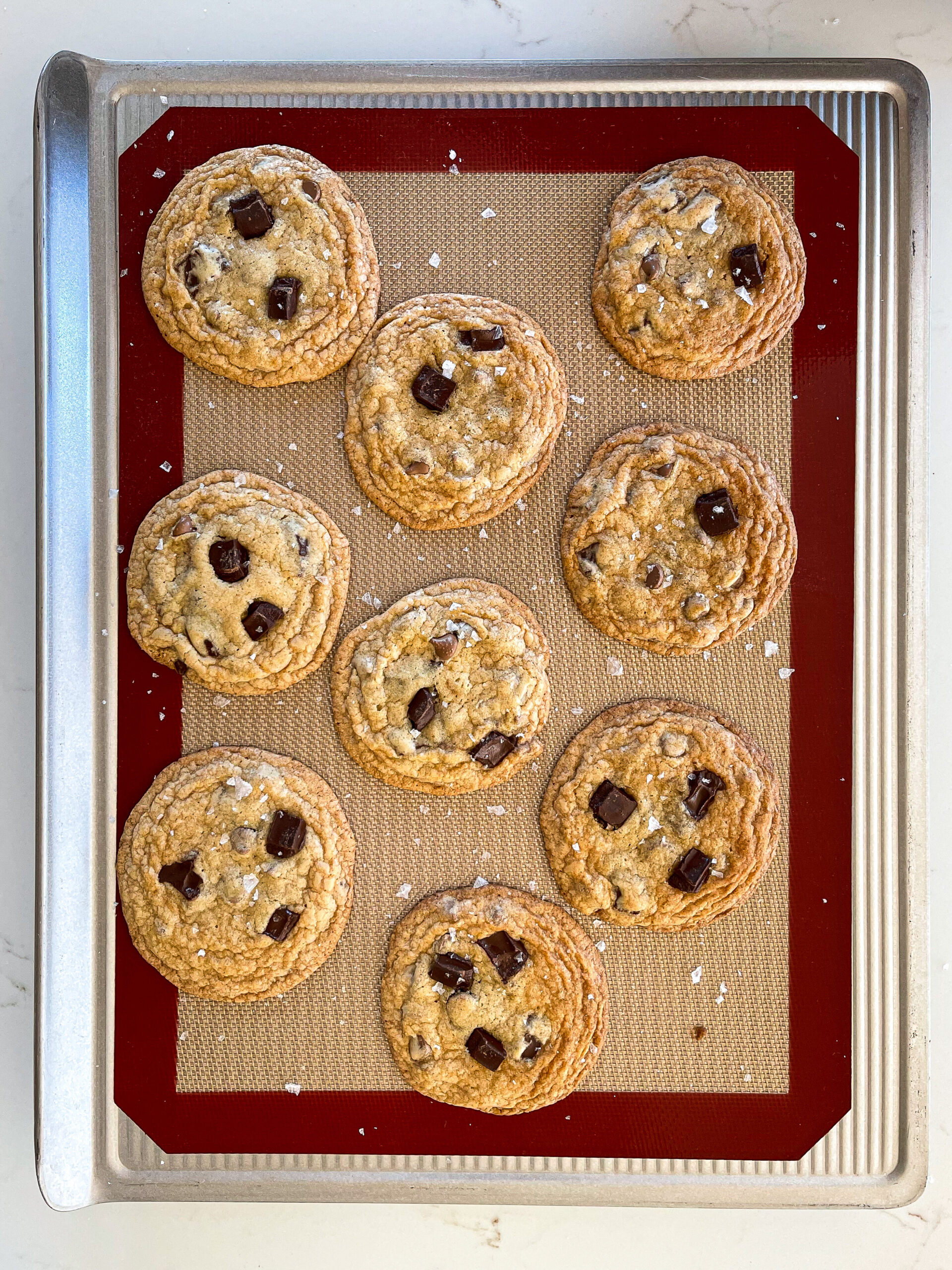 image of no chill chocolate chip cookies that have been garnished with flakey sea salt