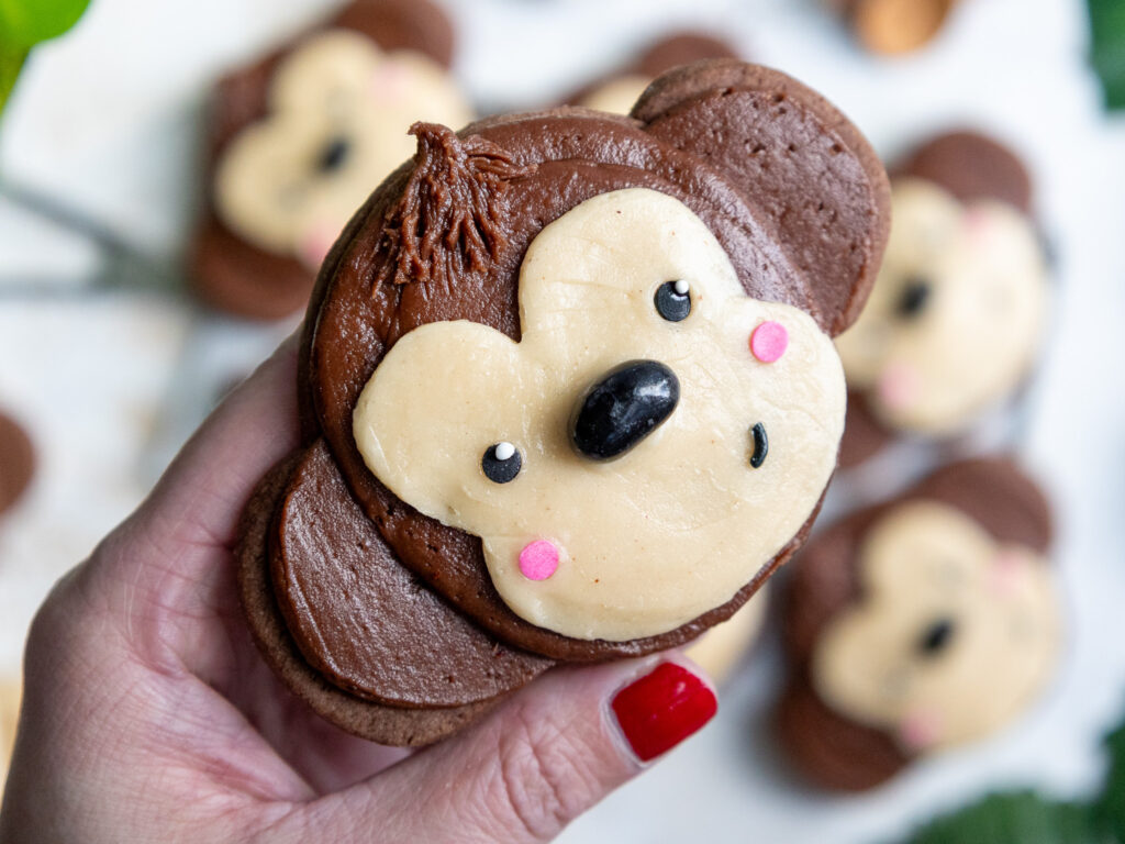 image of a cute monkey cookie decorated with buttercream frosting
