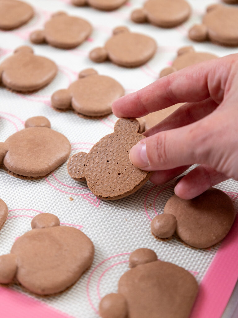 image of a bear macaron shell that has been properly baked so it peels off the mat cleanly and has a shiny bottom