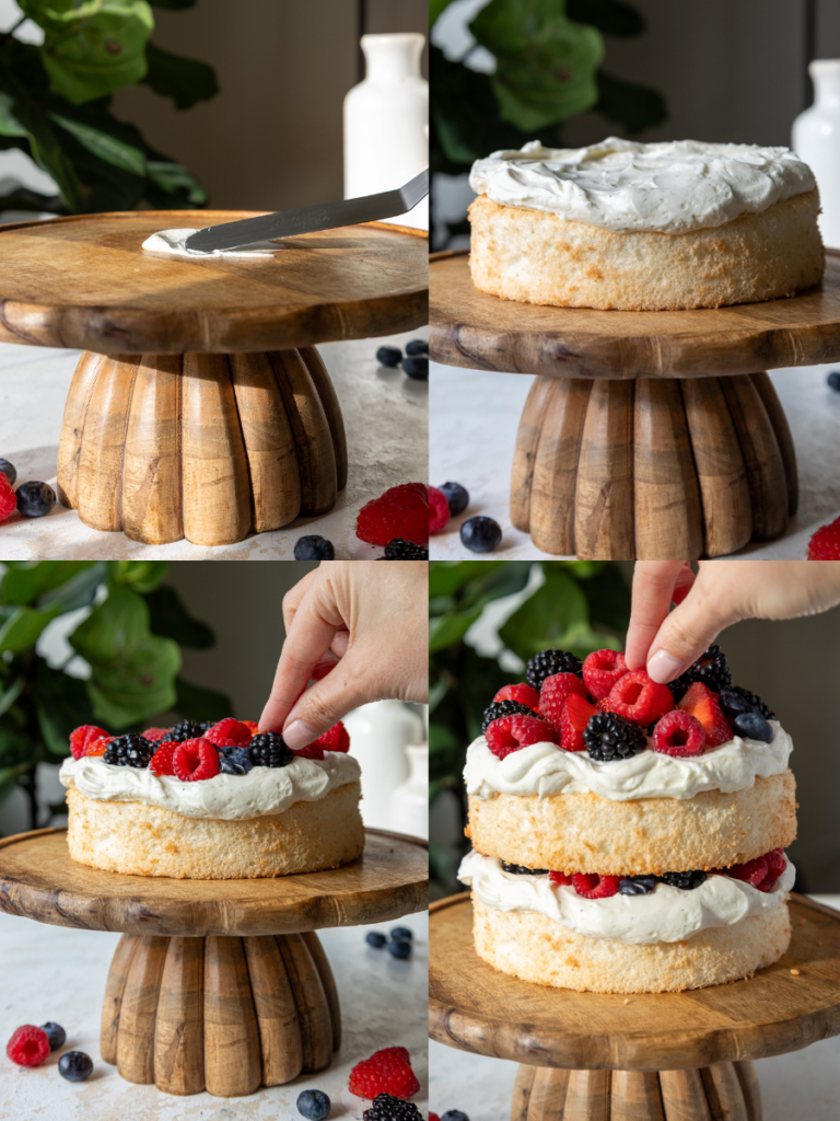 image of a berry smash cake being assembled with whipped cream frosting