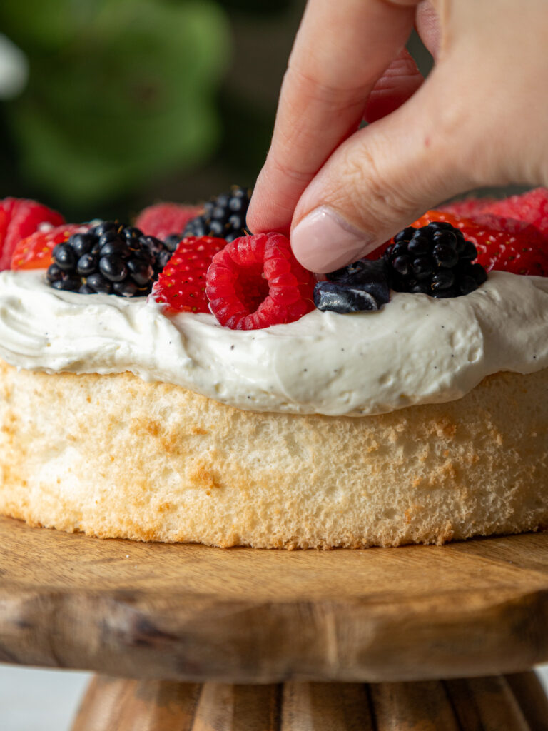 image of a smash cake that's been made with angel food cake and whipped cream frosting