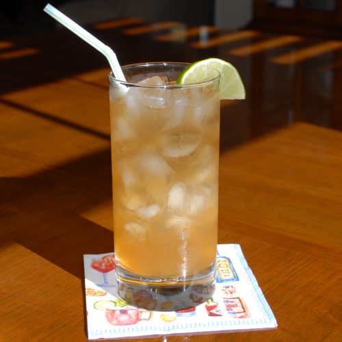 Dark and Stormy made with Dark Rum, Ginger Beer and lime