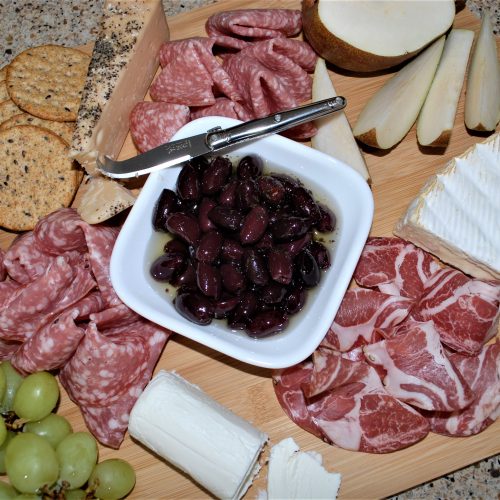 Your happy hour go to! A Charcuterie Board delicious delicacy