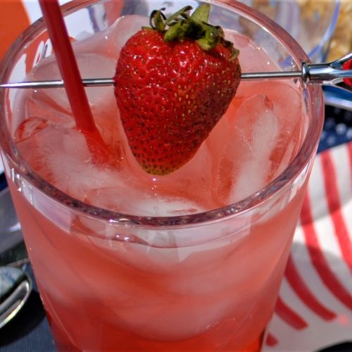 You need to taste this mind blowing sweet and sour Jolly Rancher cocktail!