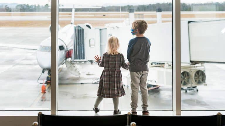 Kids looking out window