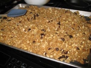 Image shows baked homemade granola cooled down.