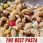 Closeup of the best pasta salad in a silver bowl.