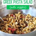 Greek pasta salad in a bowl overhead shot.