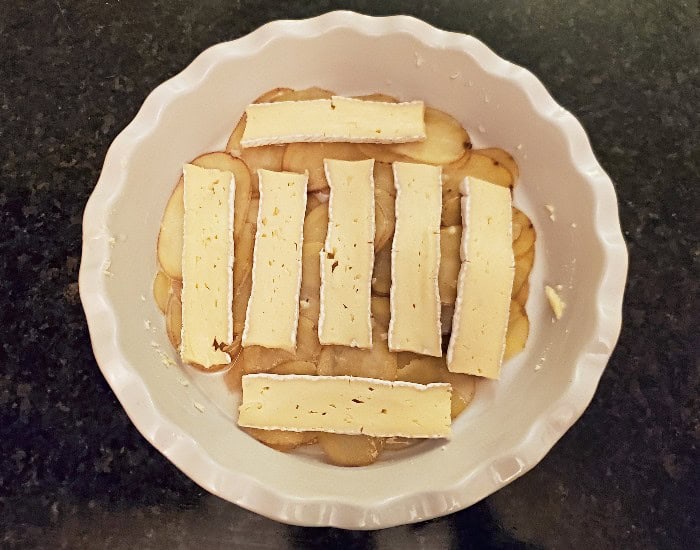 Add brie to potatoes