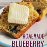 Closeup of sliced muffin with butter and text homemade blueberry muffins.