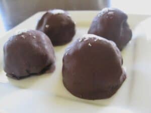 Image shows perfect truffles on a plate.