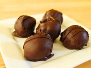 Image shows summer truffles on a serving plate.