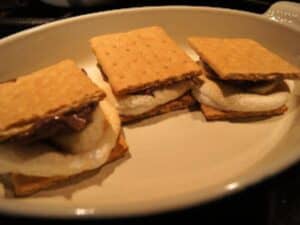 Image shows Banana Split S'mores on a serving plate.