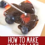Strawberries and blueberries dipped in chocolate on a plate with text how to make chocolate fondue.