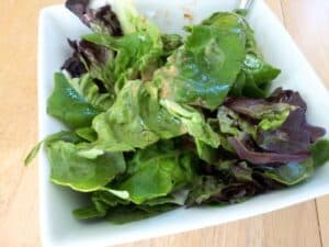 Image shows roasted garlic aioli salad dressing.