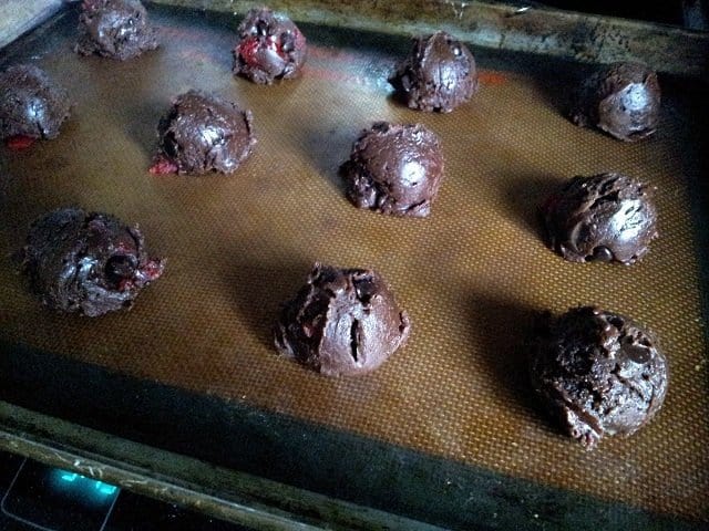 Double Chocolate Chunk Cherry Cookies spaced on a tray for baking