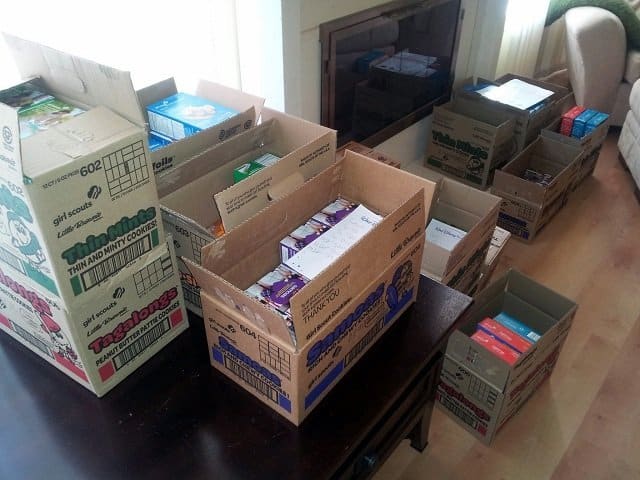 Piles of cookies ready to go to girls