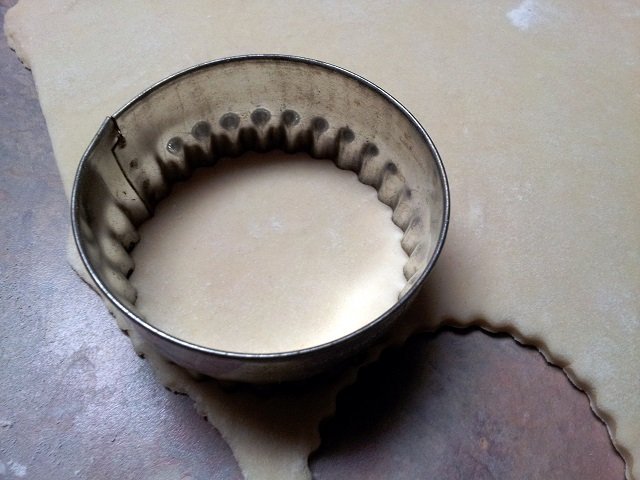 Cutting out rounds to make pierogies