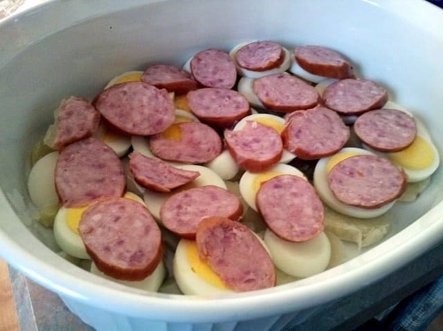 Layers of potato, egg, and meat
