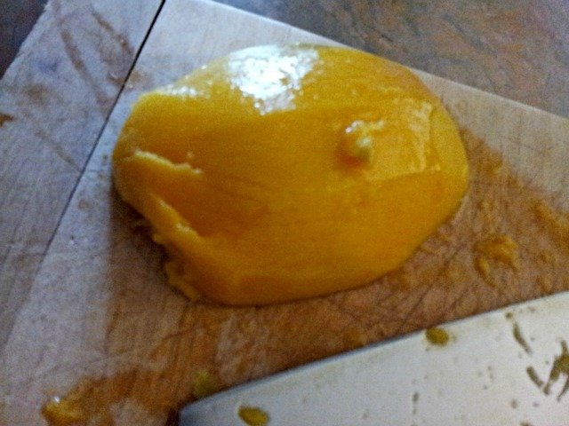 Mango peeled and removed from the pit