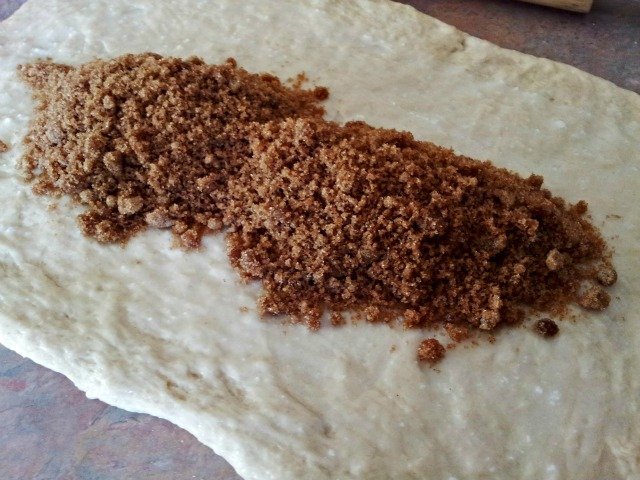Fill your cinnamon rolls with the filling poured into the center then spread