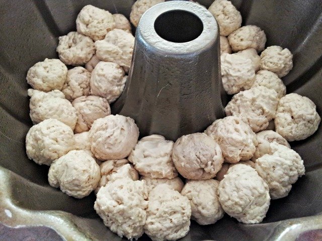 Simply rolls walnut size pieces of dough and place them in a greased bundt pan