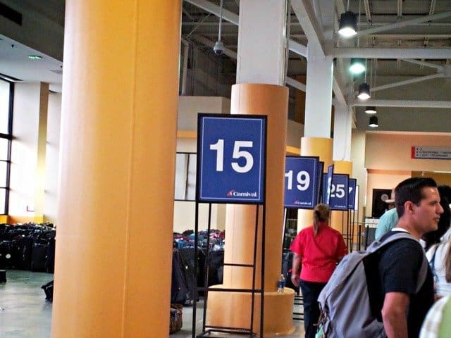 Carnival disembarkation terminal with luggage and customs line