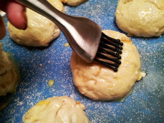 Brush the tops of the rolls with an egg wash