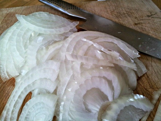 Slice onions thinly to caramelize them well