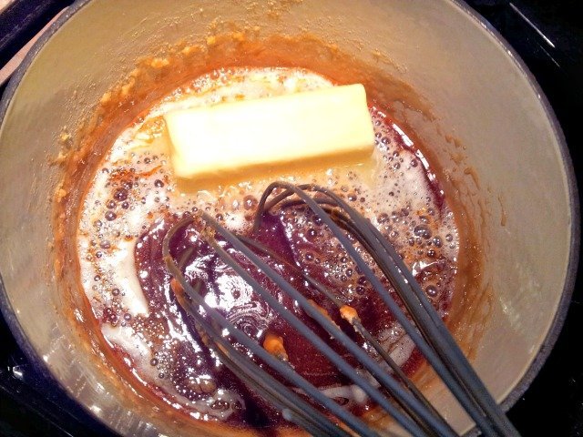 Adding butter makes the sugar mixture bubble