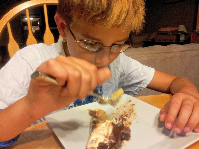 Mister Man quickly eating his cake