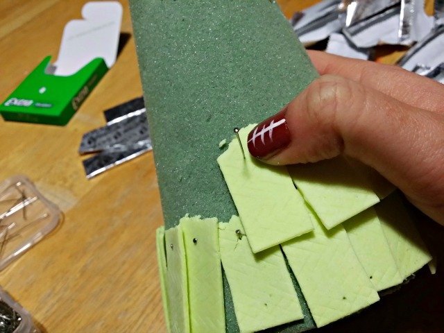 attaching the gum to the tabletop tree