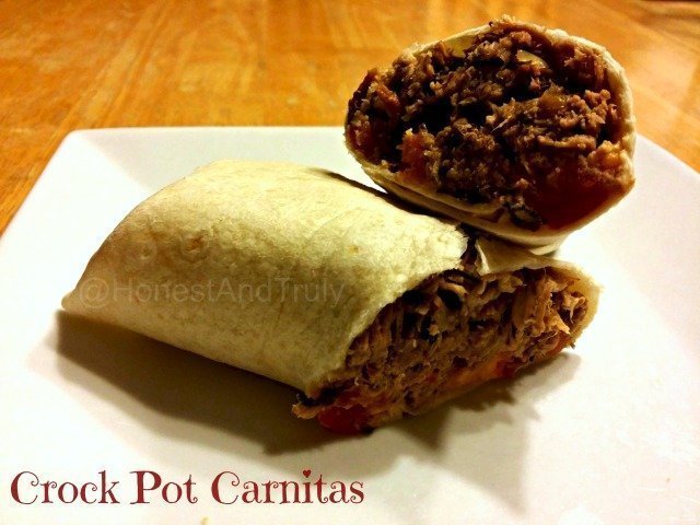 Carnitas burritos sliced on a plate