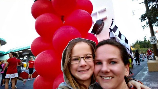 Celebrating the end of the fun run with Little MIss