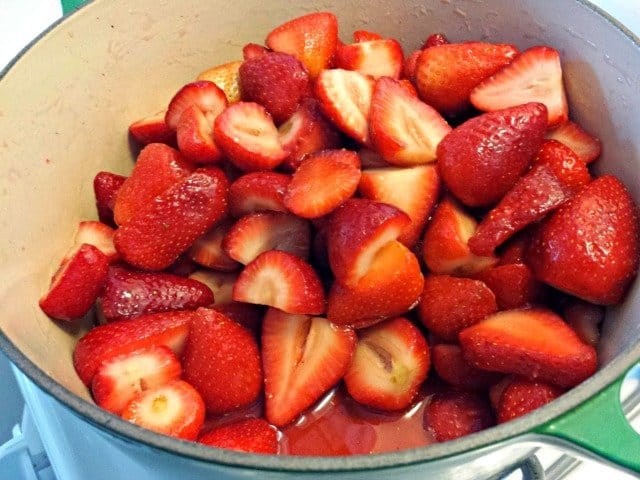 Strawberries will start releasing their juices when mixed with sugar