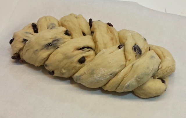 Challah dough completely braided and ready to rise again