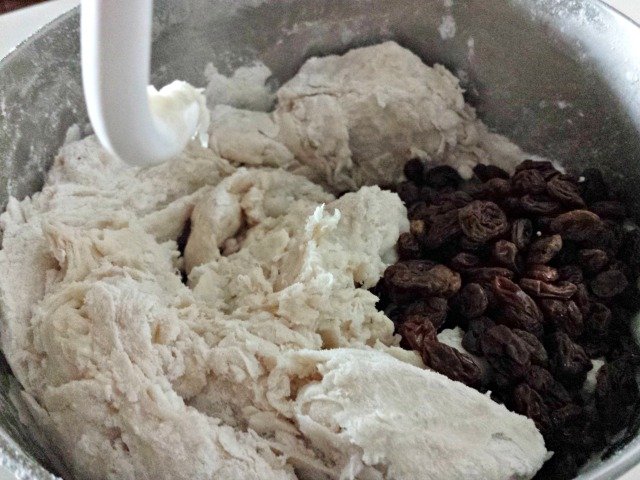 Add raisins once your dough is mostly kneaded