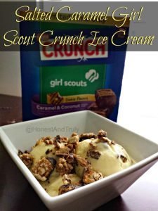 A white bowl with ice cream topped by candy bar pieces with the text salted caramel Girl Scout Crunch ice cream.