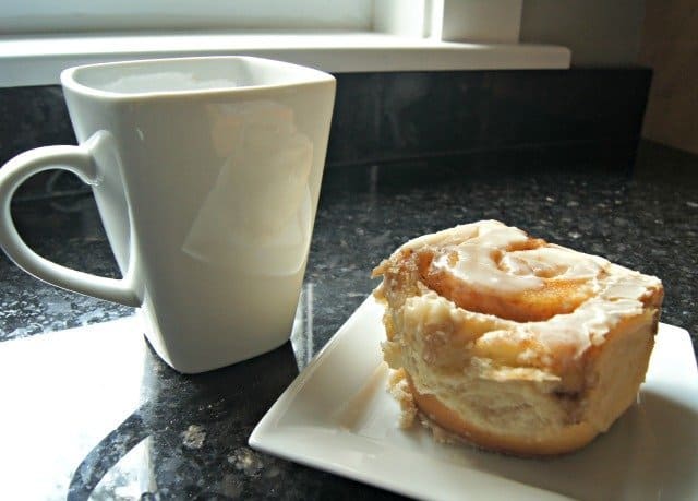 Enjoying a homemade vanilla chai cinnamon roll