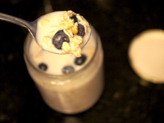 Enjoying overnight oatmeal with blueberries