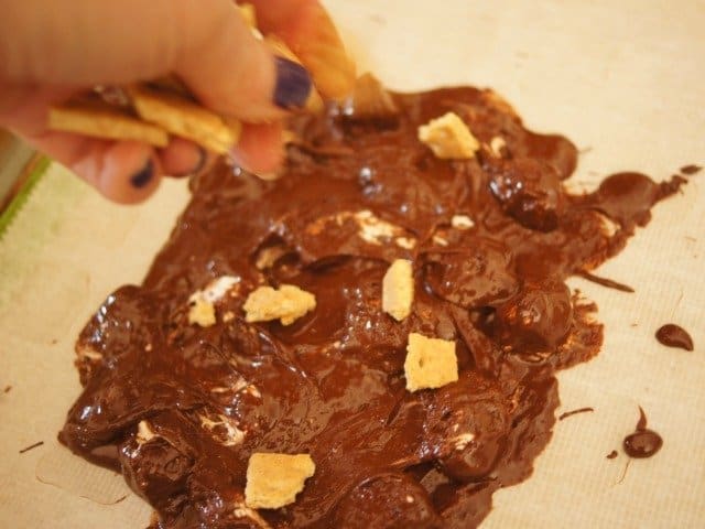 Adding graham crackers to smores bark