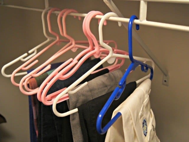 Use old baby hangars as pants hangars