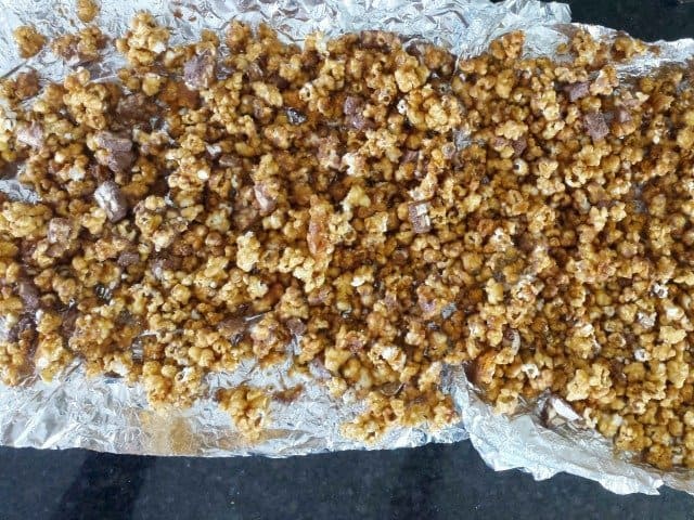 SNICKERS popcorn ready for drizzle