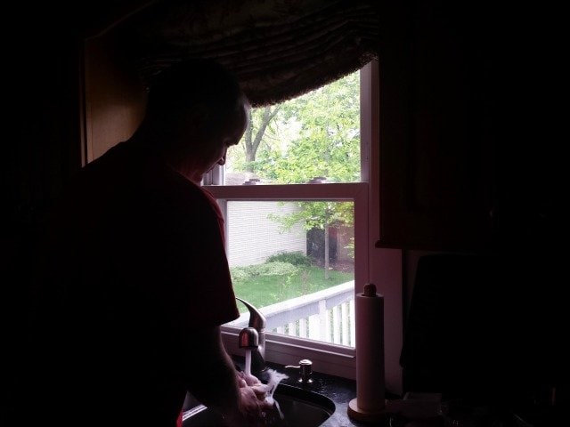 Daddy washes dishes