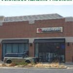 Exterior of Meatheads restaurant and Meatheads Voracious Reading Program verbiage.